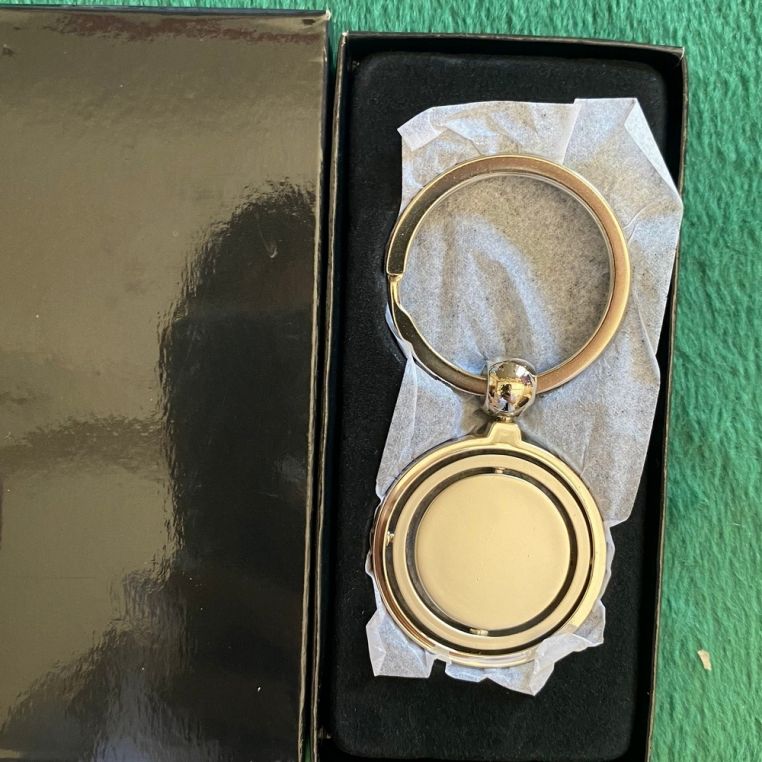 Брелок металевий Ø33 мм поворотний - Зображення 3